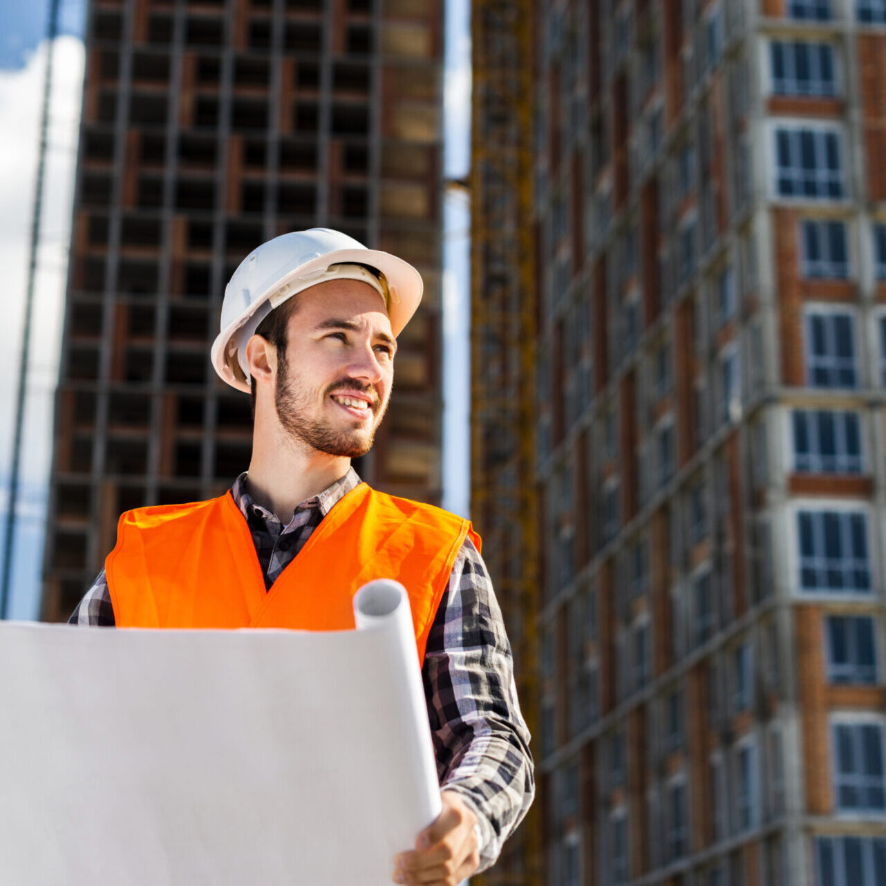 medium-shot-low-angle-view-of-architect-looking-away-3-scaled